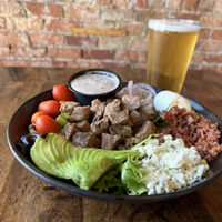 Cobb salad with tri tip steak and a pint of First Light Lager