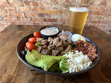 Cobb salad with tri tip steak and a pint of First Light Lager