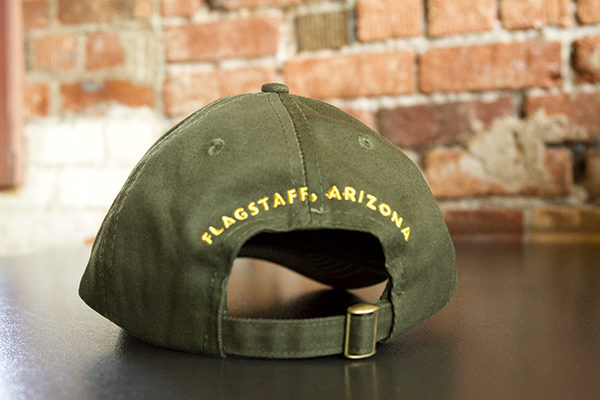 Green Hat with flagstaff Arizona label